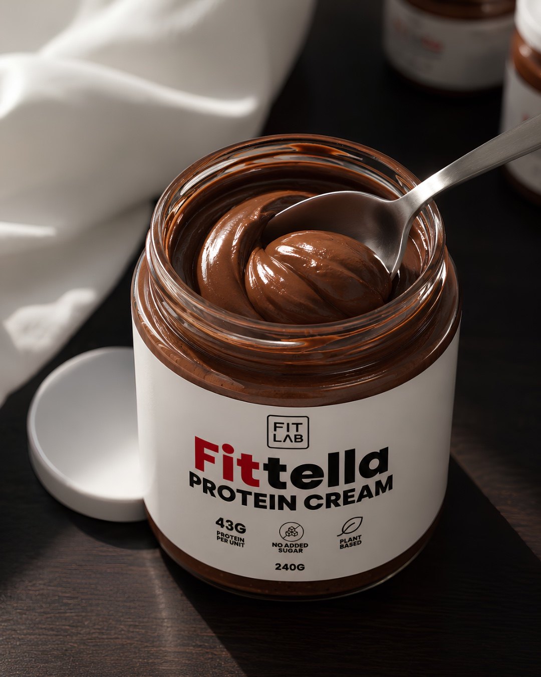 Frasco de Fittella abierto con una cuchara dentro